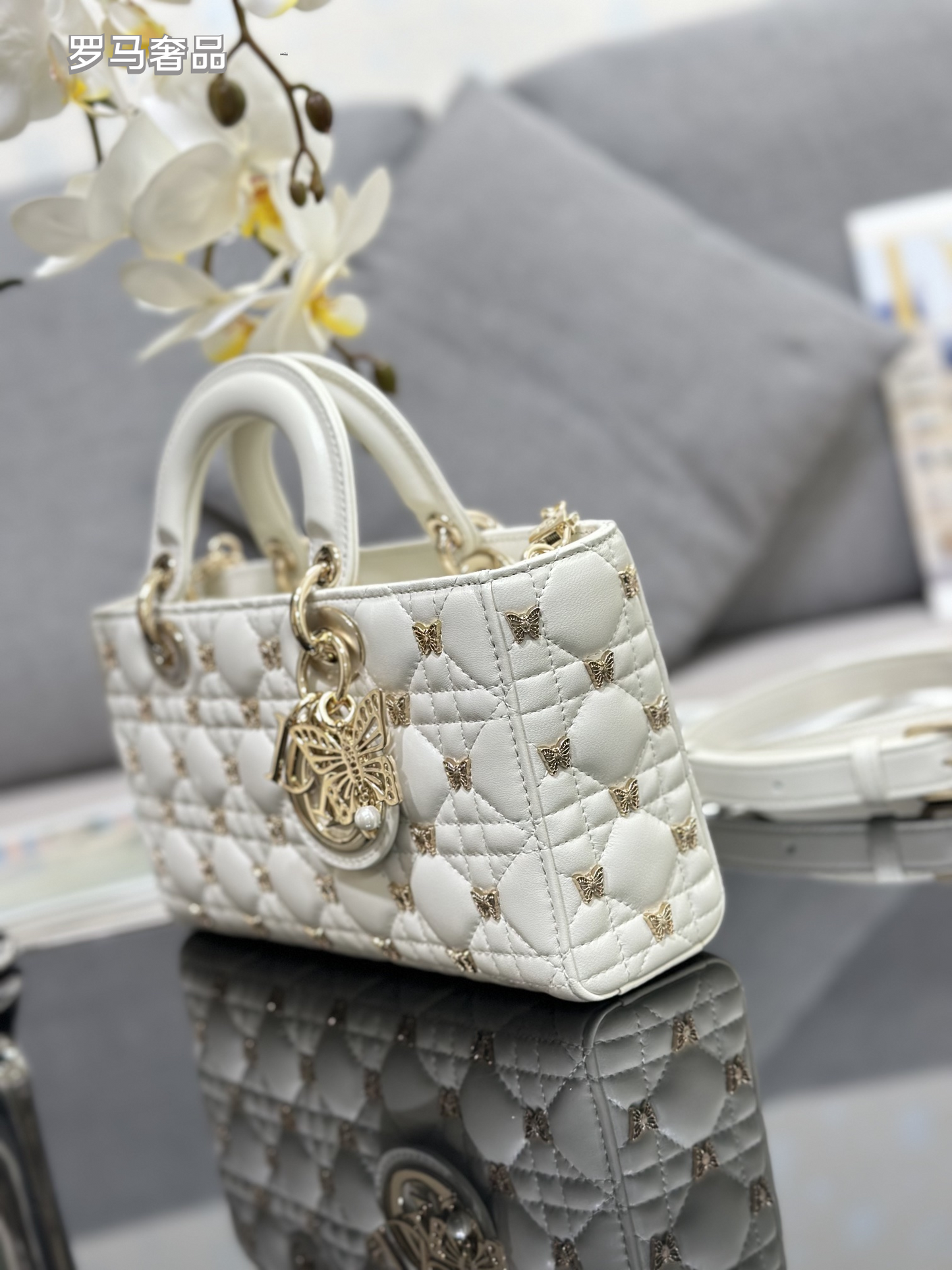 Dior Luxury Black Quilted Leather Top Handle Bag with Gold Butterfly Charm
